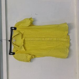Yellow button-up blouse